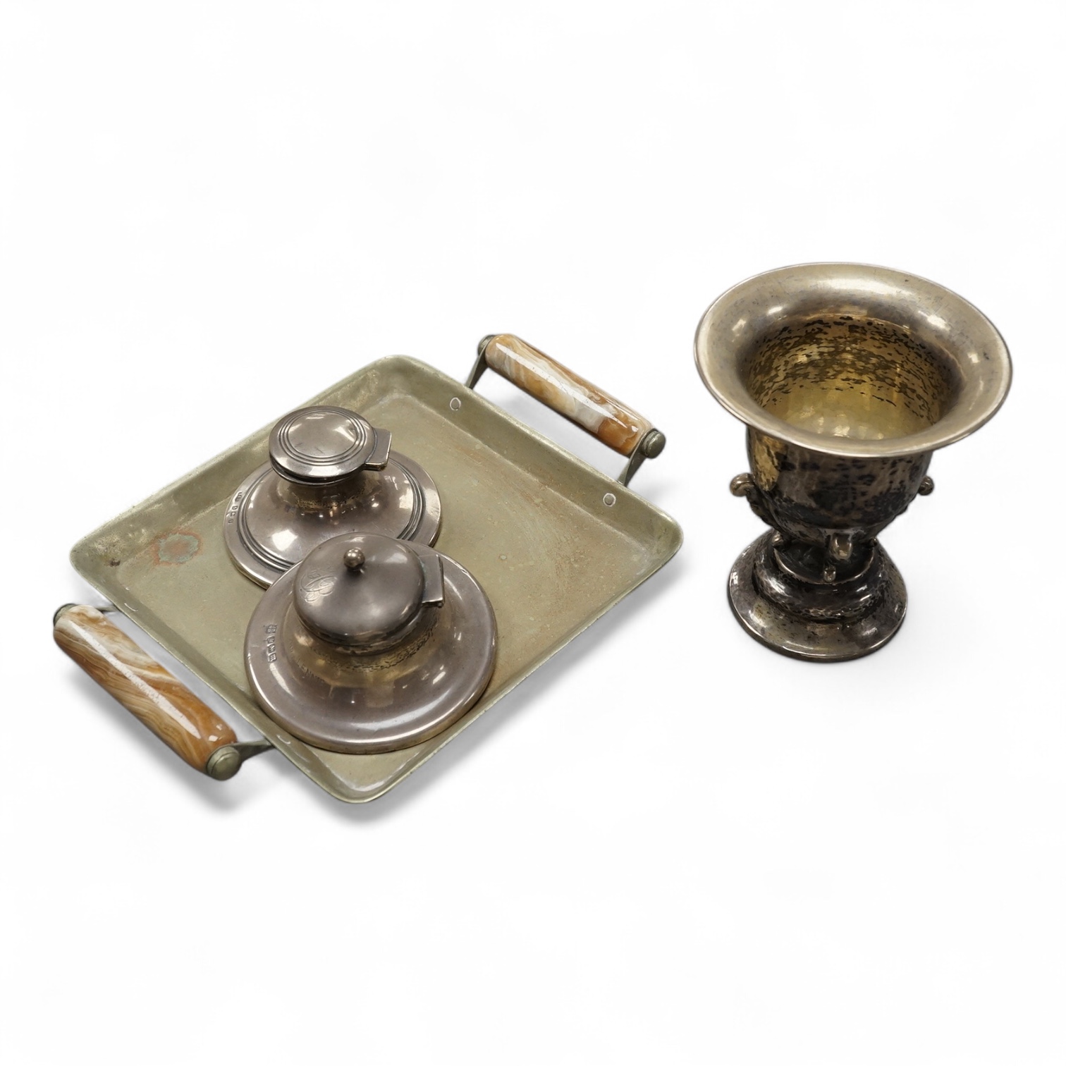 Two early 20th century silver mounted capstan inkwells, including James Deakin & Sons, Sheffield, 1904, 82mm, together with an early 20th century white metal two handled vase With Danish and Swedish marks and a two handl